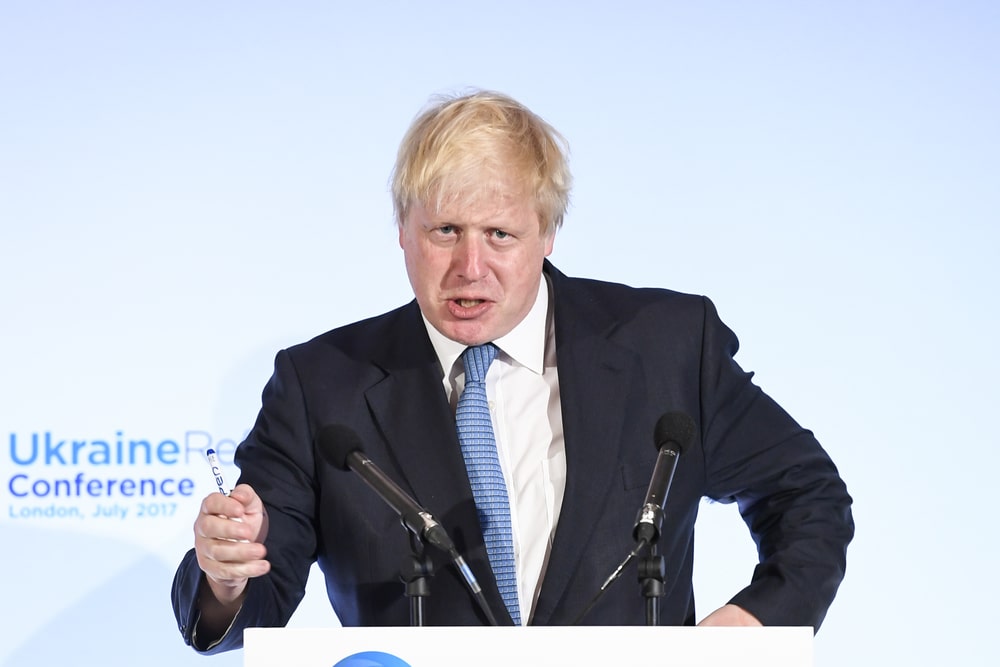 Unmasking Putin’s Propaganda: Boris Johnson’s Scathing Rebuke of Tucker Carlson’s Kremlin Visit